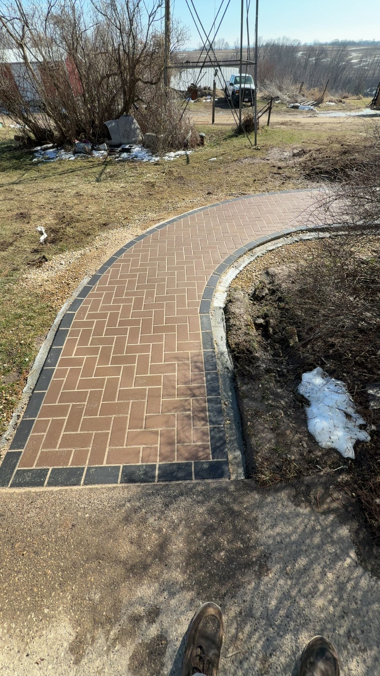 Gallery photos for Curved Brick Paver Pathway Laid Right Through Winter: Image #1
